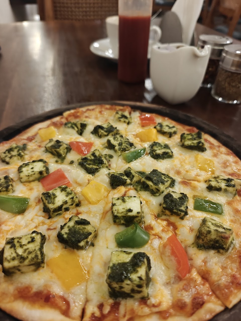 Paneer Pesto Pizza at Cafe Hustle