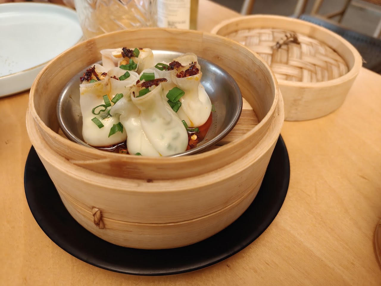 Charcoal Chicken Dumplings at Lucky Chan